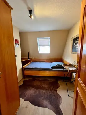 Ein Bett oder Betten in einem Zimmer der Unterkunft PUB 111 - Die Altstadt Unterkunft