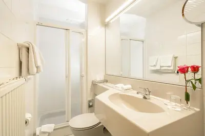 Ein Badezimmer in der Unterkunft Pension Rose