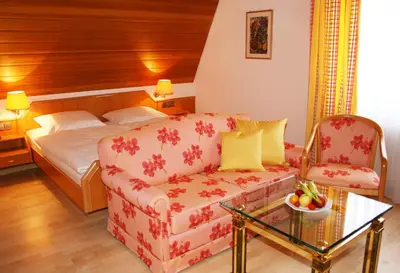 Ein Bett oder Betten in einem Zimmer der Unterkunft Pension Rose