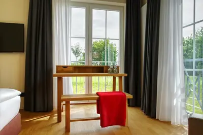 Ein Bett oder Betten in einem Zimmer der Unterkunft Hotel Zielonka