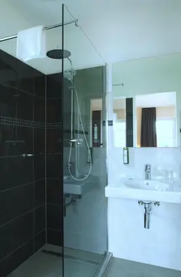 Ein Badezimmer in der Unterkunft Hotel Zielonka