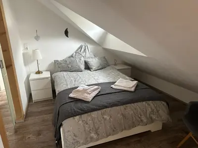 Ein Bett oder Betten in einem Zimmer der Unterkunft Old Bridge View Apartment