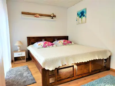 Ein Bett oder Betten in einem Zimmer der Unterkunft Apartment de luxe 73 qm mit 3 Zimmer und Terrasse