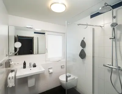 Ein Badezimmer in der Unterkunft ANA Living Karlsruhe, Trademark Collection by Wyndham