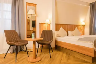 Ein Bett oder Betten in einem Zimmer der Unterkunft Hotel Neckarblick