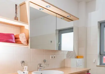 Ein Badezimmer in der Unterkunft Muellers Weingut und Weinstube im Auerberg
