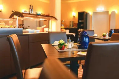 Ein Sitzbereich in der Unterkunft PLAZA Hotel Bruchsal