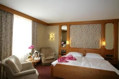 Ein Bett oder Betten in einem Zimmer der Unterkunft Hotel-Restaurant Arneggers Adler