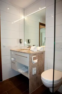 Ein Badezimmer in der Unterkunft Hotel-Restaurant Arneggers Adler