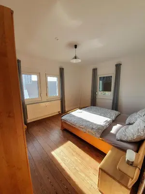 Ein Bett oder Betten in einem Zimmer der Unterkunft Ferienwohnung Schwarzwaldblick