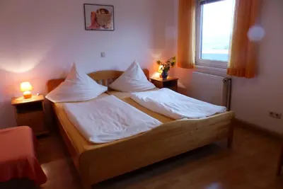 Ein Bett oder Betten in einem Zimmer der Unterkunft Pension Schreckhof