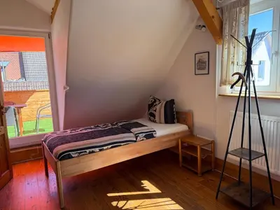 Ein Bett oder Betten in einem Zimmer der Unterkunft Bella Haus close to Frankfurt Messe