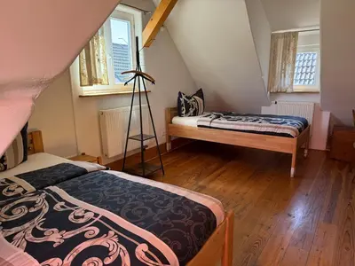 Ein Bett oder Betten in einem Zimmer der Unterkunft Bella Haus close to Frankfurt Messe