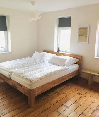Ein Bett oder Betten in einem Zimmer der Unterkunft Monteurwohnung Ferienhaus für bis zu 4 Personen