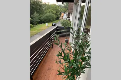 Ein Balkon oder eine Terrasse in der Unterkunft SUNSIDE Idyllisches Apartment am Wasser
