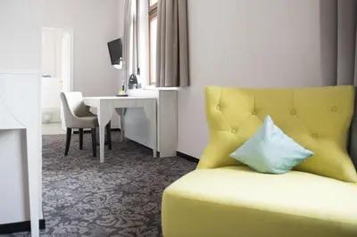 Ein Sitzbereich in der Unterkunft Parkhotel Schillerhain