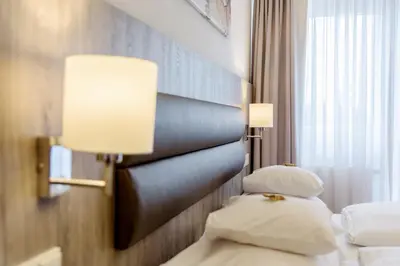 Ein Bett oder Betten in einem Zimmer der Unterkunft Hotel Engelhorn