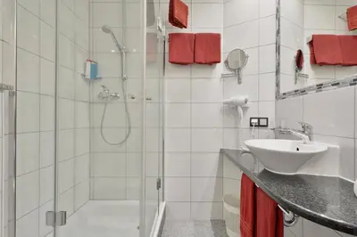 Ein Badezimmer in der Unterkunft Hotel Engelhorn