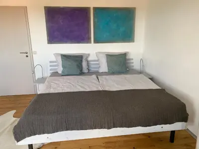 Ein Bett oder Betten in einem Zimmer der Unterkunft Atelier de Pfalz-Loftstyl mit Pfalzblick