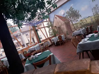 Ein Restaurant oder anderes Speiselokal in der Unterkunft Brauereigasthof Dachsenfranz