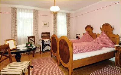 Ein Bett oder Betten in einem Zimmer der Unterkunft Brauereigasthof Dachsenfranz