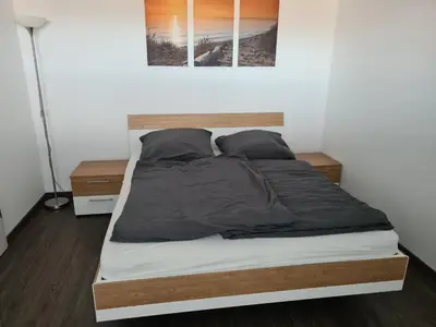 Ein Bett oder Betten in einem Zimmer der Unterkunft 1,5 ZKB Wohnung im Odenwald, an der Bergstraße mit tollem Ausblick