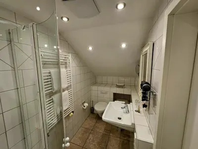 Ein Badezimmer in der Unterkunft Hotel Villa Marstall