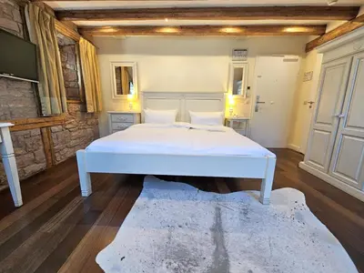 Ein Bett oder Betten in einem Zimmer der Unterkunft Hotel Villa Marstall