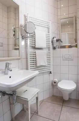 Ein Badezimmer in der Unterkunft Hotel Villa Marstall