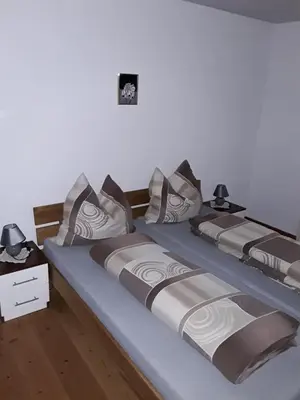 Ein Bett oder Betten in einem Zimmer der Unterkunft Ferien- und Monteurwohnung Tina
