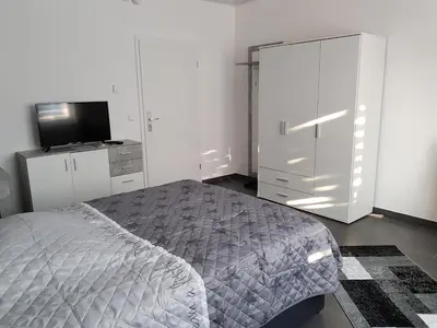 Ein Bett oder Betten in einem Zimmer der Unterkunft Feriendomizil Bauer