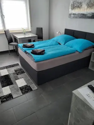Ein Bett oder Betten in einem Zimmer der Unterkunft Feriendomizil Bauer