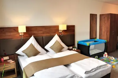 Ein Bett oder Betten in einem Zimmer der Unterkunft Motel am Fürfelder Schloss