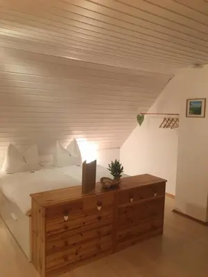 Ein Bett oder Betten in einem Zimmer der Unterkunft Ferienhaus Bärbelstein- Burgblick