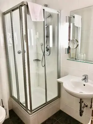 Ein Badezimmer in der Unterkunft Hotel Central