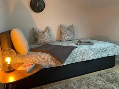 Ein Bett oder Betten in einem Zimmer der Unterkunft Charmante Ferienwohnung 100 qm