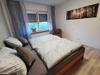 Ein Bett oder Betten in einem Zimmer der Unterkunft Haus Fröhlich
