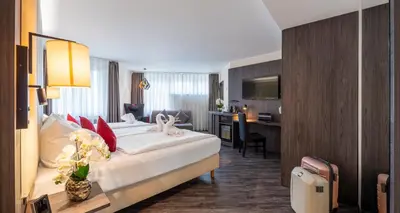 Ein Bett oder Betten in einem Zimmer der Unterkunft PLAZA INN Blankenburg Ditzingen, Sure Hotel Collection