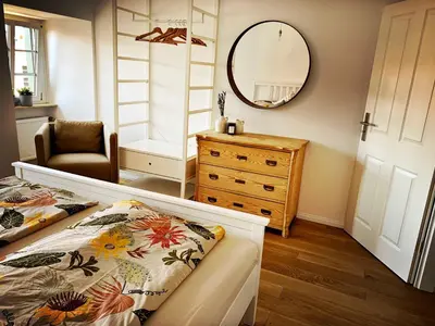 Ein Bett oder Betten in einem Zimmer der Unterkunft Schwarzer Adler