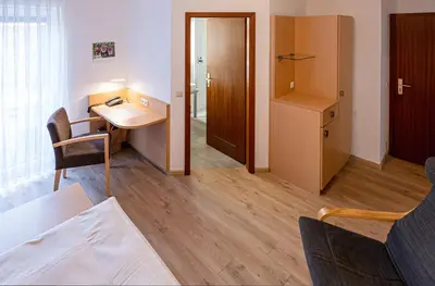Ein Sitzbereich in der Unterkunft Hotel Phönix