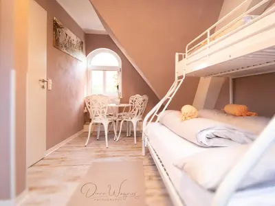 Ein Bett oder Betten in einem Zimmer der Unterkunft Historia Hotel