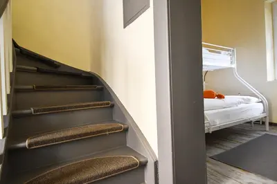 Ein Bett oder Betten in einem Zimmer der Unterkunft Historia Hotel