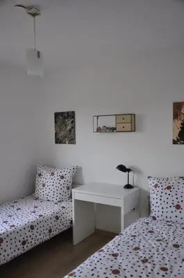 Ein Bett oder Betten in einem Zimmer der Unterkunft Über den Wolken und super zentral zwischen Frankfurt und Darmstadt - 100qm