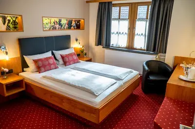 Ein Bett oder Betten in einem Zimmer der Unterkunft Gasthaus Zur Krone