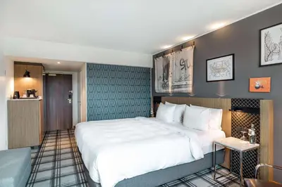 Ein Bett oder Betten in einem Zimmer der Unterkunft Radisson Blu Hotel Karlsruhe
