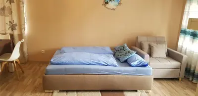 Ein Bett oder Betten in einem Zimmer der Unterkunft Ferienwohnung in dem schönen Kurort Bad Dürkheim