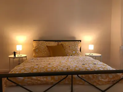 Ein Bett oder Betten in einem Zimmer der Unterkunft Turmwohnung Büdinger Hof