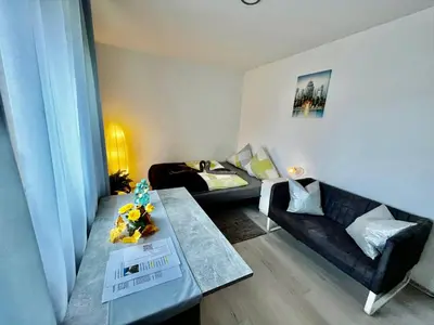 Ein Sitzbereich in der Unterkunft Pension mit Herz und Garten