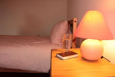 Ein Bett oder Betten in einem Zimmer der Unterkunft E Kurhaus Wohnung Nr 5