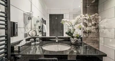 Ein Badezimmer in der Unterkunft PLAZA INN Heilbronn